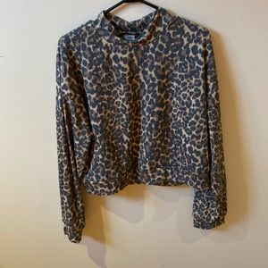 High neck, long sleeve cheetah print shirt